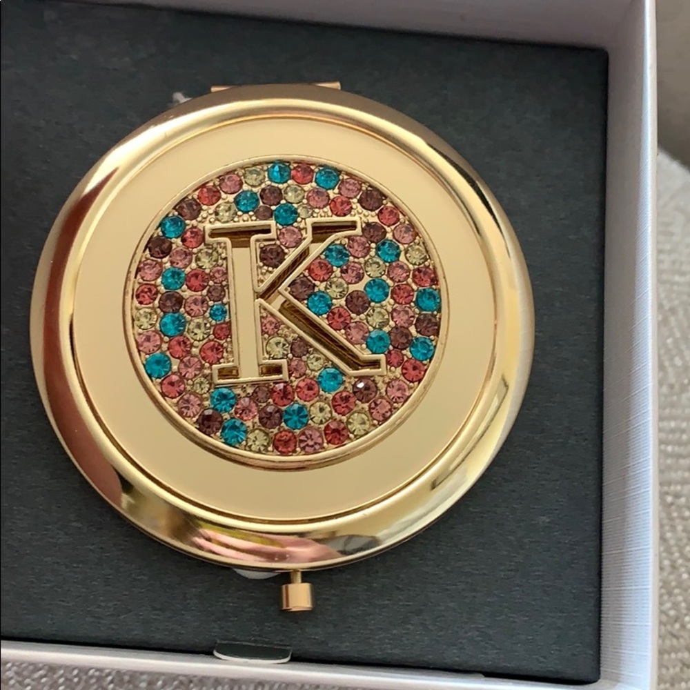 “K” makeup mirror